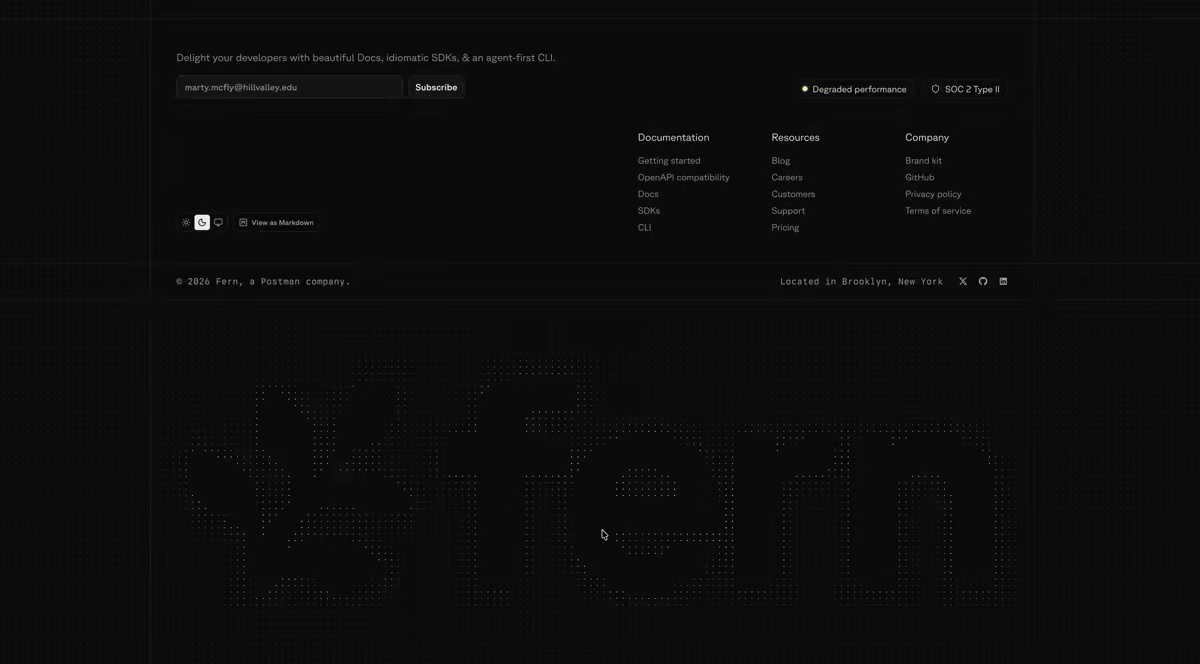 The shipped site footer in dark mode, with the dot-fern wordmark emerging from the soil pattern.