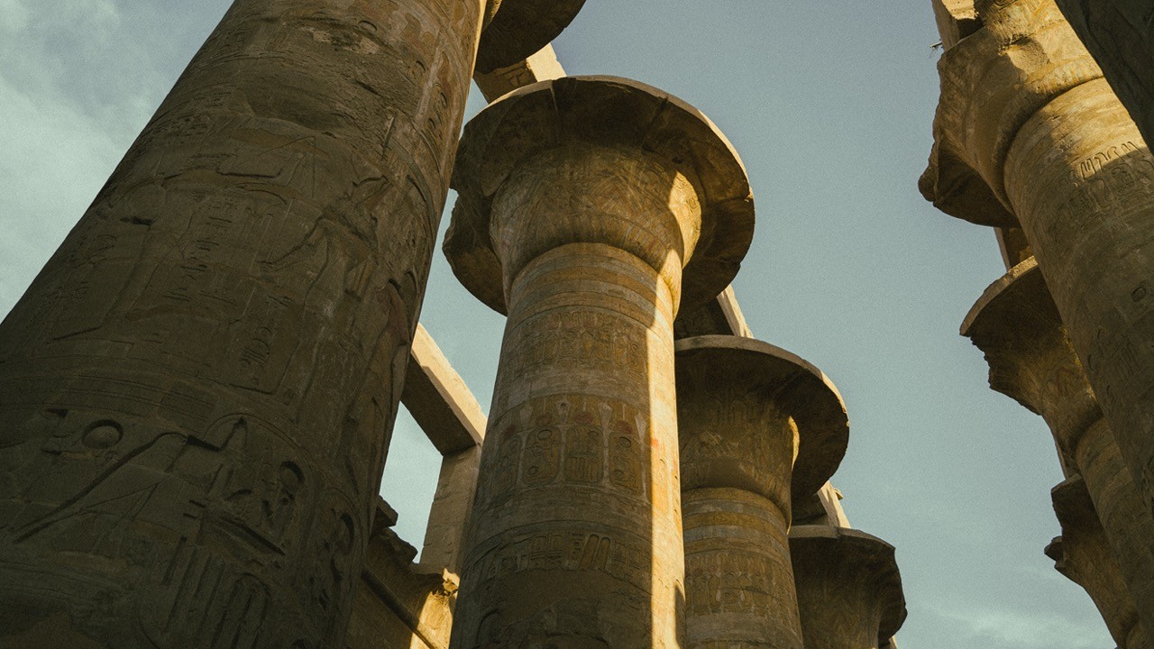 Looking through the forest of great columns in the hypostyle hall at Karnak.
